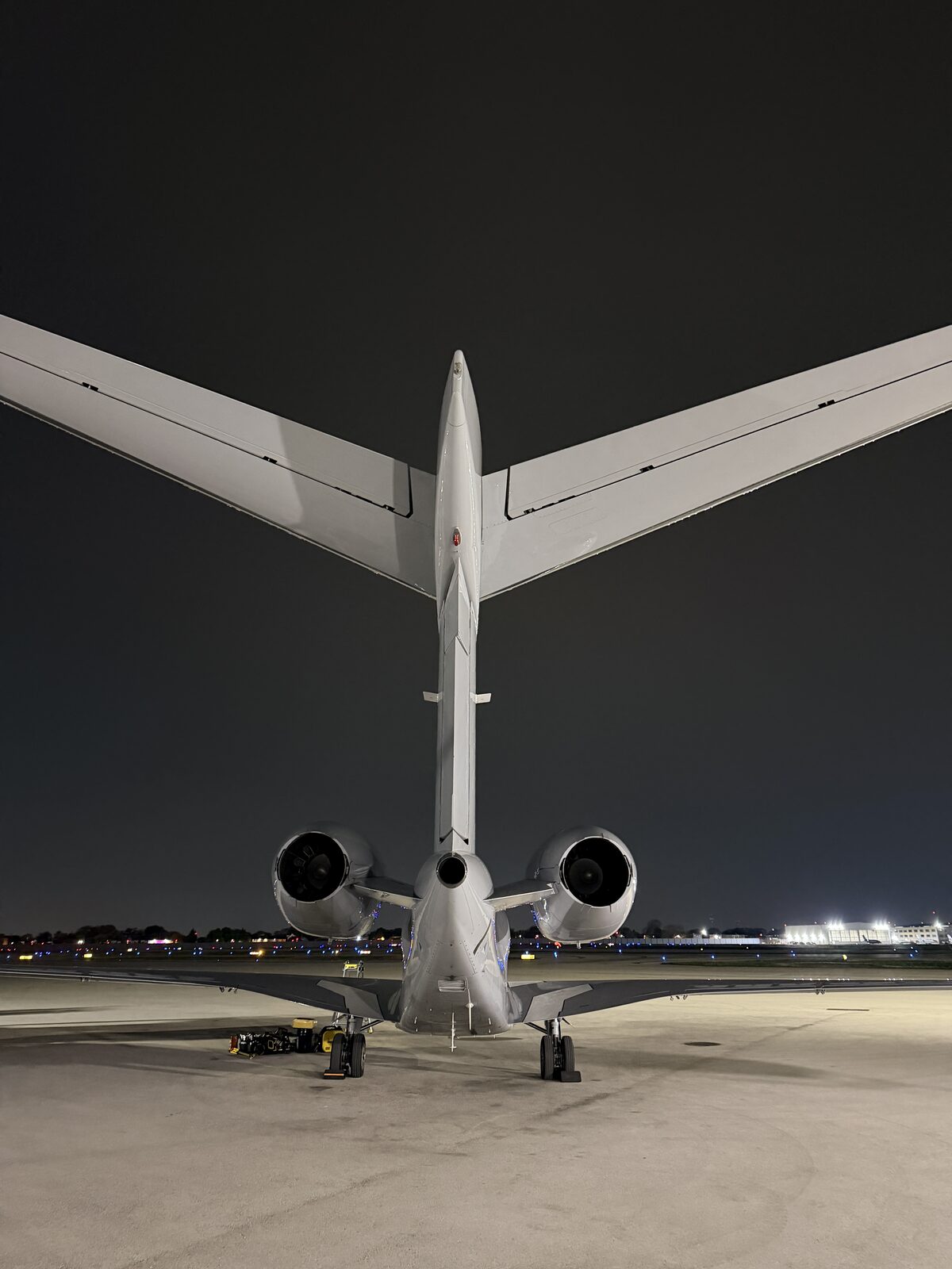 Cessna Citation X model 750 full rear view tail dual engines winglets ramp night exterior detailing Chicago