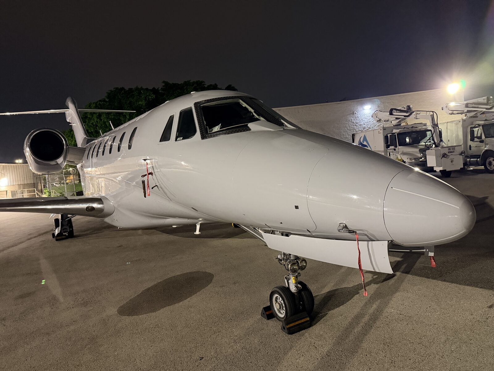 Cessna Citation X nose cockpit nose gear quarter view ramp night exterior aviation detailing